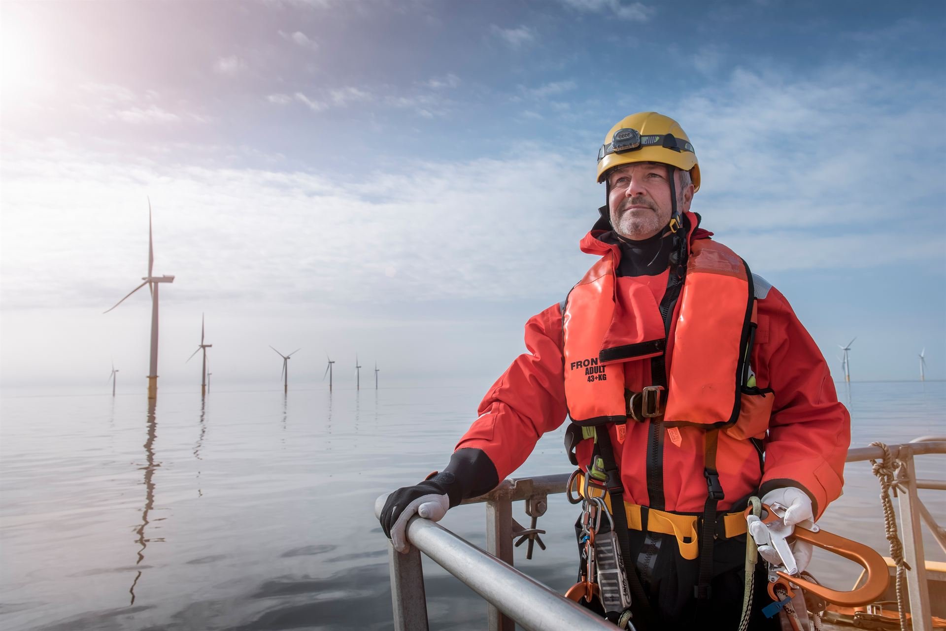 portrait-of-engineer-on-boat-at-offshore-windfarm-2024-10-18-08-39-58-utc